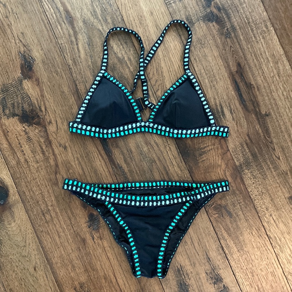 Black, small, Victoria secret bikini with green crochet detail. Gently used.